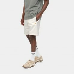 NEW ARRIVALS CARHARTT WIP CHASE SWEAT SHORT - WAX & GOLD 6 NEW ARRIVALS CARHARTT WIP CHASE SWEAT SHORT - WAX & GOLD