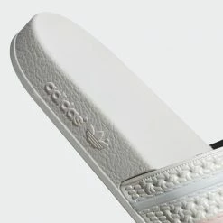 ADIDAS ADILETTE OFF WHITE W SNEAKERS