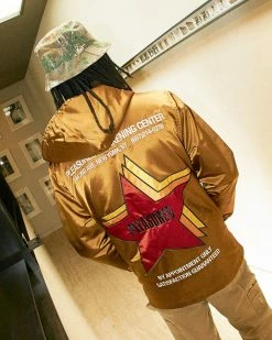 NEW ARRIVALS PLEASURES BERLIN SATIN COACHES JACKET CARAMEL